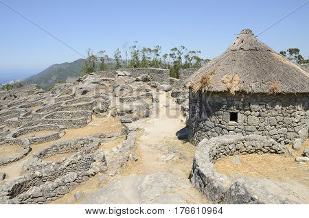 Prehistoric reconstructed house in the remains of a celtic settlement in Santa Tecla Mount in Galicia Spain.