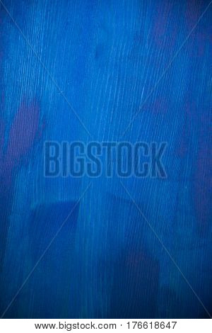 Navy blue wood texture. Navy blue wood background. Closeup view of blue wood texture and background. Abstract background and texture for designers. Texture of vintage handmade table. Rustic table.