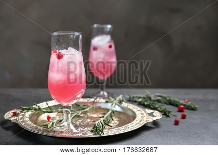 Glass with delicious wine spritzer on silver tray