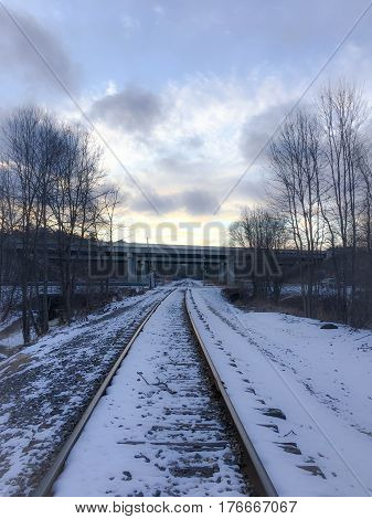 Train Track Presented in a Soft Light with Tree/Sunset Backdrop