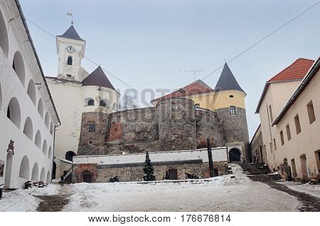Inner courtyard of ancient castle Palanok in Mukachevo Ukraine. Winter time.