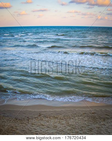 Pamorama of beautiful seascape. Nature composition. Evening sky with contrast colour clouds