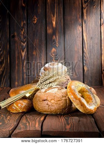 Bakery products on a wooden brown background