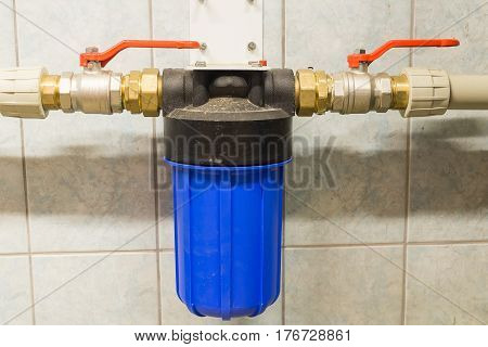 a water filter mounted in the hydraulic system