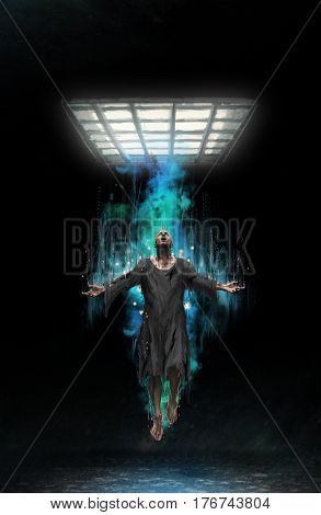 The evil wizard performs witchcraft while in prison