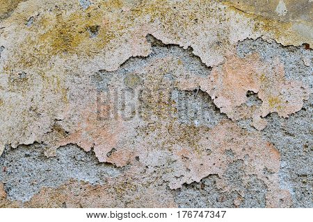 Washout cracked paint on old plaster. Old wall with texture.