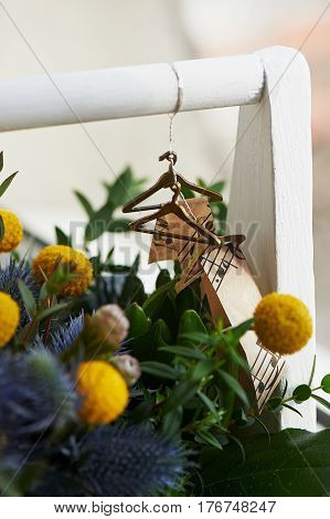 A spring bouquet in a white wooden box in the yellow-green spectrum. lemon.