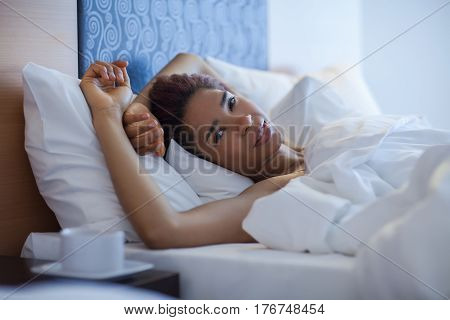 Young Happy Black Woman Lying In A Bed.