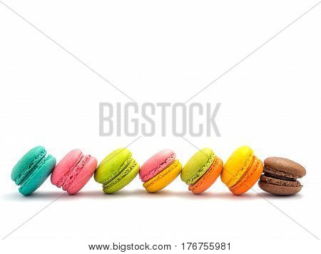 Sweet and colourful french macaroons or macaron on white background Dessert.