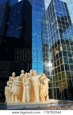 MONTREAL - MAY 3, 2009: Sculpture The Illuminated Crowd in front of BNP Tower on McGill College Avenue, Montreal, Quebec, Canada.