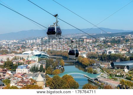 TBILISI, GEORGIA, NOVEMBER, 08: Lonely furnicular cabin up in the air going to the centre on nowember, 05, 2016 in Georgia