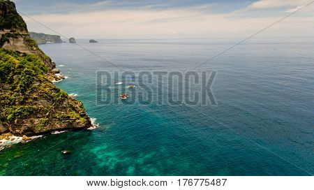 Aerial view of seascape near Temeling bay Nusa Penida Bali Indonesia