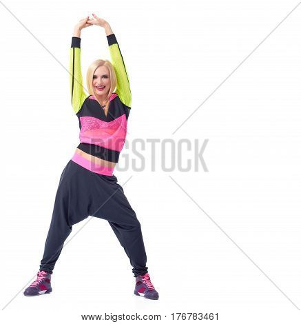 Shake it up. Cheerful young female hip hop dancer performing against white background copyspace on the side