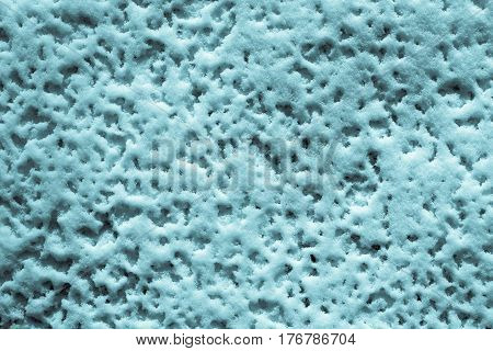 abstract natural background of texture of friable turquoise snow