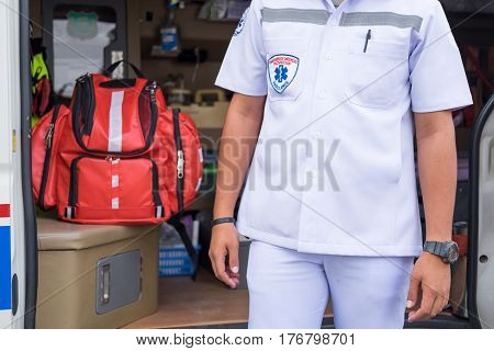 Nurse Standing Beside Ambulance Prepare For Helping People