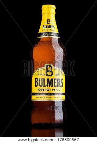 LONDON UK - MARCH 15 2017: Bottle Of Bulmers Original Cider on a black background with reflection. It is one of the leading British cider brands in the UK