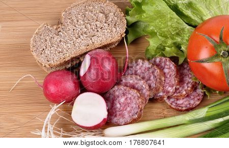breakfast with home made kolbasz, tomato, onion and bread