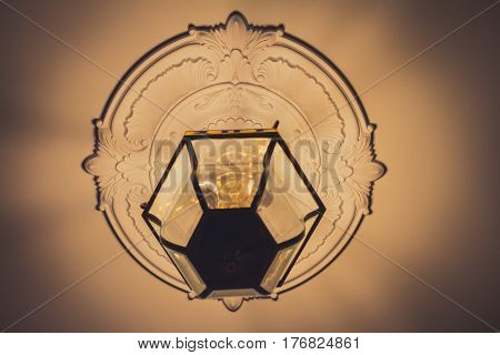 Antique glass lamp hanging on the ceiling