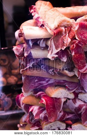 Mountain of Iberian pork ham sandwiches. No people