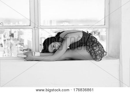 Beautiful graceful young ballerina in pointe shoes