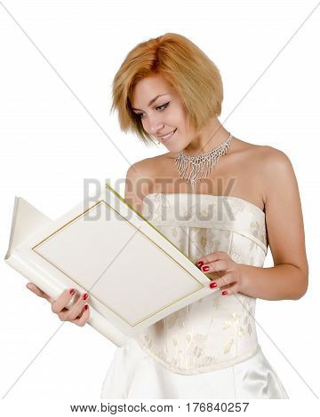 Happy girl in a white evening dress and necklace. Bare shoulders. Butch. Isolated on white background