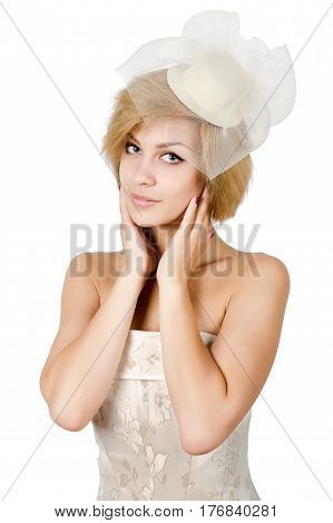 Happy girl in a white evening dress and necklace. Bare shoulders. Butch. Isolated on white background