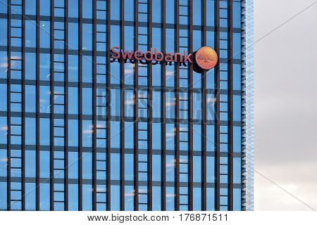 VILNIUS MARCH 16: The Head Office of Swedbank on March 16 2017 in Vilnius Lithuania. Swedbank is the leading bank in Sweden Estonia Latvia and Lithuania.