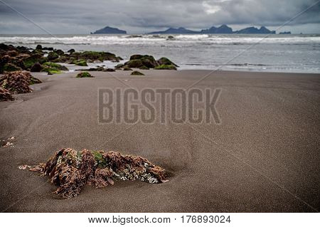 Black sands of Vestmann Islands on Iceland