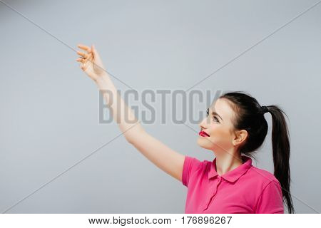 Woman showing sign looking happy excited. Advertisement.