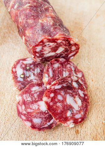 Sliced Italian Salami On Wooden Board