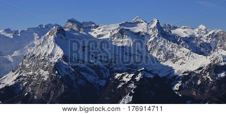 Brunnistock and Uri Rotstock. Snow covered mountains in Central Switzerland.