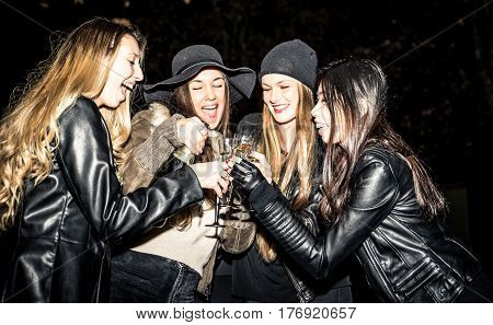 Four girls making party outdoor in the night