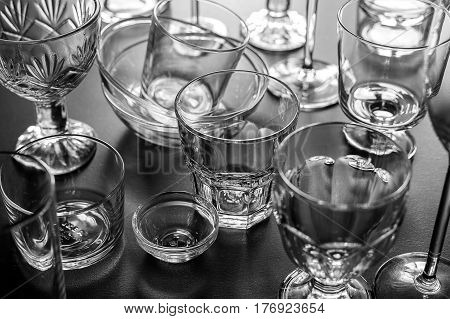 Clean different glasses on gray background. Horizontal