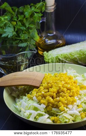 Fresh vegetable and dietary salad from cabbage and corn