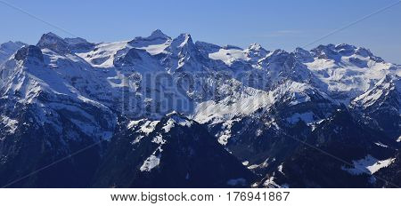 Uri Rotstock and other mountains seen from mount Fronalpstock Switzerland.