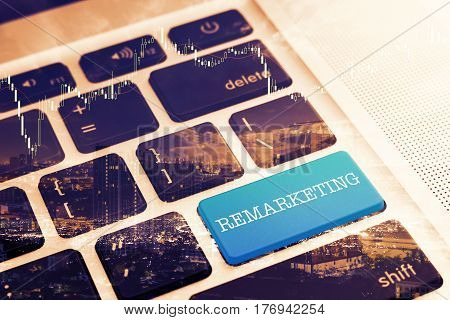 REMARKETING: Close up green button keyboard computer. Vintage Effects. Digital Business and Technology Concept.