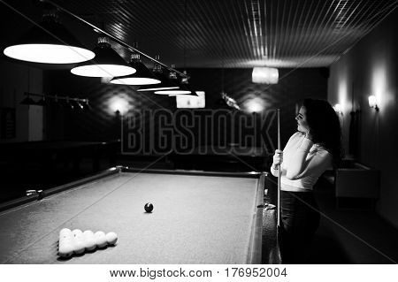 Young Curly Girl Posed Near Billiard Table. Sexy Model At Black Mini Mini Skirt Play Russian Snooker