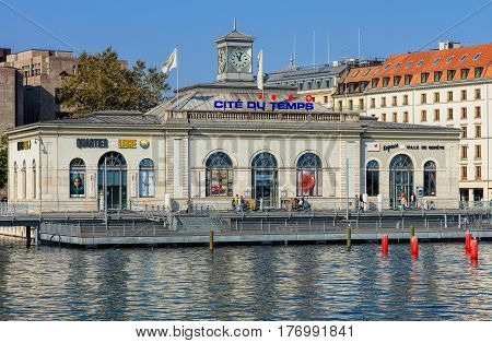 Geneva, Switzerland - 24 September, 2016: the La Cite du Temps building, view from the Pont des Bergues bridge. La Cite du Temps is a public exhibition center focusing on the world of time, hosting a wide variety of different exhibitions.