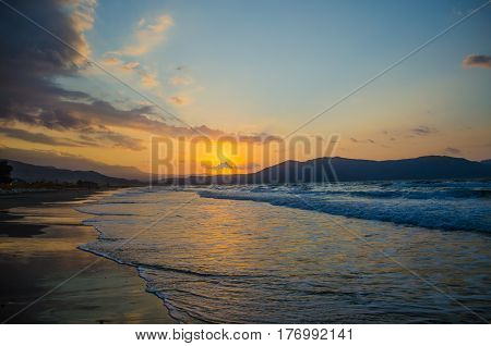 Sunset over the sea on the island of Crete