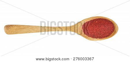 Ground Sumac Spice Powder In Wooden Spoon Isolated On White Background. Top View. Flat Lay