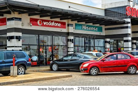 Shopping Center And Cars. Vodafone Office. Vehicles In A Parking Lot. World Brands. Hisense Store. S