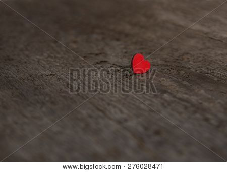 Single Small Wooden Red Heart On An Old Dry Wooden Board For Valentines Day Close Up