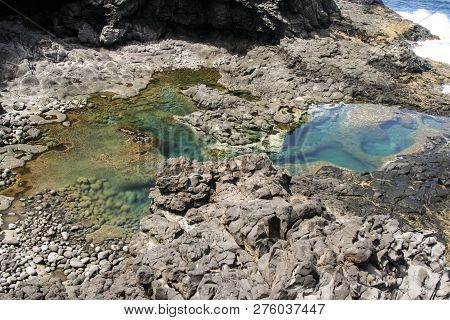Natural Pool At The Coastside Of Lanzarote In Nature