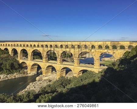 Historic Aqueduct Pont Du Gart In Afternoon Light
