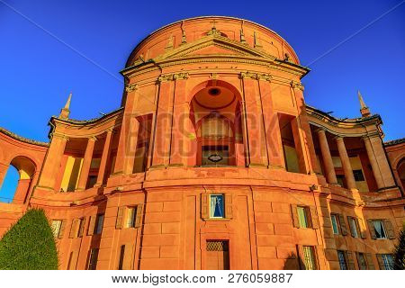 Facade Of San Luca Holy Mary Sanctuary Of Bologna At Sunset Light. The Catholic Cathedral Of San Luc