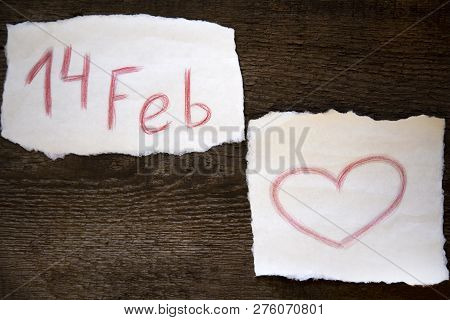February 14 Is Written In Red Pencil On A Piece Of Paper, The Heart Is Drawn In Red Pencil On A Piec