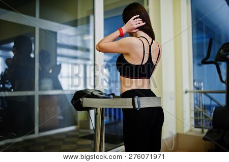 Young Sport Girl Workout In Gym. Fitness Woman Doing Exercises. Sexy Ass At Anticellulite Massager S