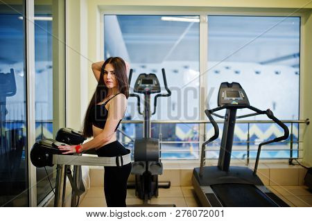 Young Sport Girl Workout In Gym. Fitness Woman Doing Exercises. Sexy Ass At Anticellulite Massager S