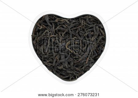 Da Hong Pao Oolong Tea, Heart-shaped, Close Up, Isolated. Chinese Big Red Robe Oolong Tea Used As En