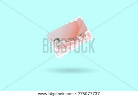 Frozen Red Credit Card In White Ice Blocks